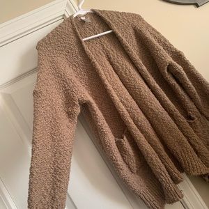 Brown sweater with small pocket detail